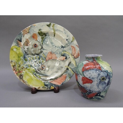 A Jonathan Cox 'Sea Deep' vase and circular plate, tubelined...