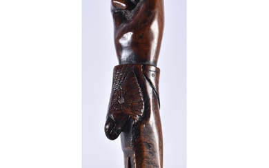 A LARGE 18TH/19TH CENTURY CONTINENTAL CARVED FOLK ART FIST A...