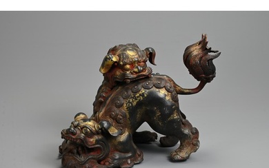 A LARGE CHINESE PARCEL GILT AND RED LACQUERED BRONZE INCENSE...