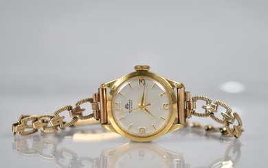 A Ladies 18ct Gold Cased Bucherer Wrist Watch, Silvered Dial...