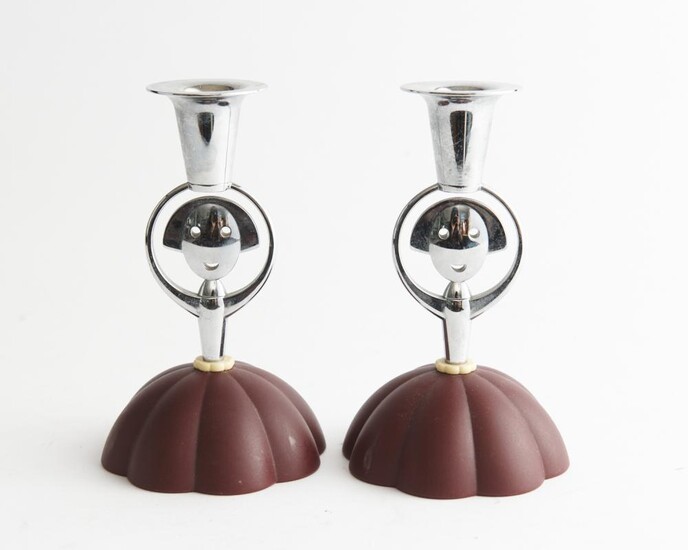 A PAIR OF ALESSI CANDLE HOLDERS, DESIGNED BY ALESSANDRO MENDINI, 1999, H.17CM, LEONARD JOEL LOCAL DELIVERY SIZE: SMALL