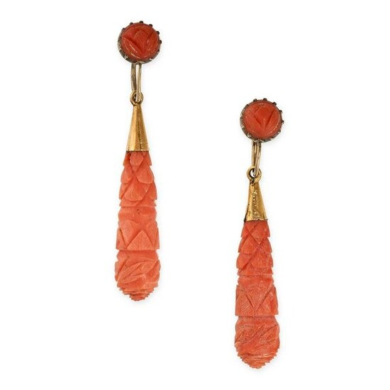 A PAIR OF ANTIQUE CARVED CORAL DROP EARRINGS in yellow