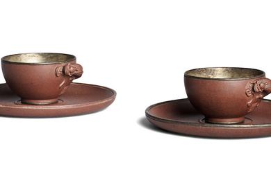 A PAIR OF YIXING STONEWARE SILVER-LINED CUPS AND SAUCERS Dicheng...