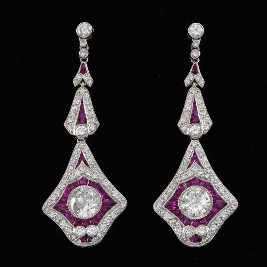 A Pair of 1.52 ct and 1.30 ct Diamond and Ruby Earrings