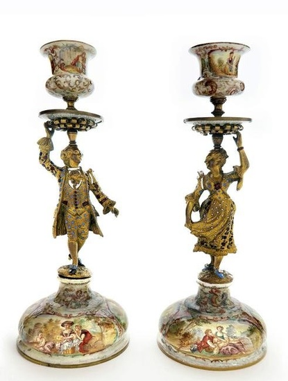 A Pair of Silver Viennese Enamel Figural Candlesticks