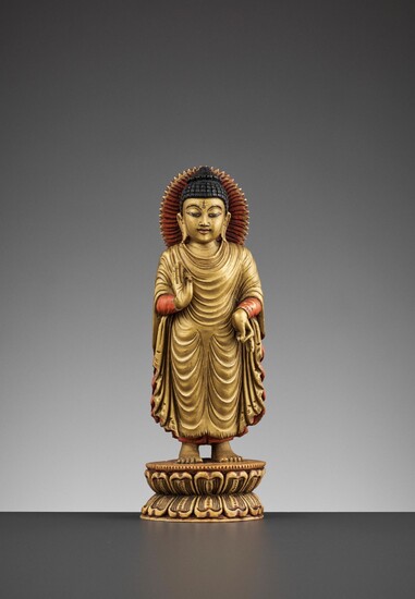 A TIBETAN-CHINESE PAINTED AND GILT IVORY FIGURE OF BUDDHA, LATE MING TO EARLY QING DYNASTY...