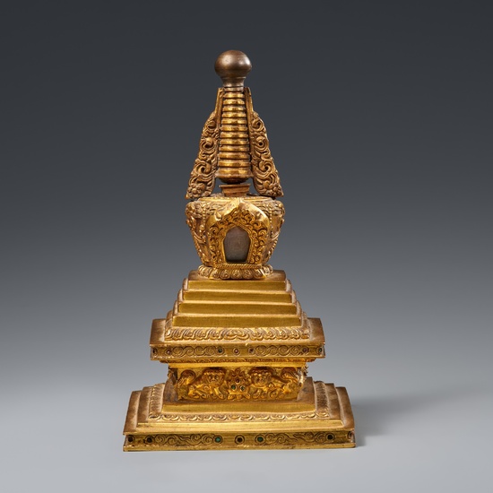 A Tibetan fire-gilt bronze bumpa-stupa. 18th century or later