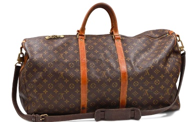 A VINTAGE LOUIS VUITTON KEEP ALL CANVAS BAG, with top...