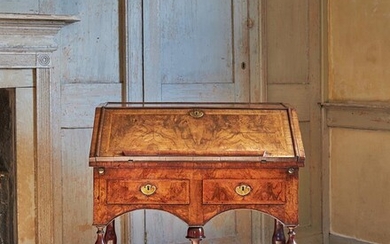 A DOUBLE-SIDED FIGURED WALNUT AND FEATHER BANDED BUREAU ON STAND, CIRCA 1690 AND LATER