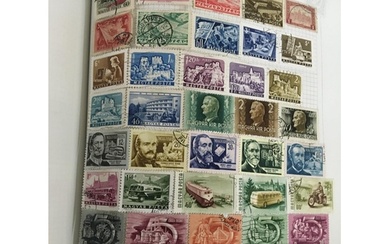 A collection of nine stamp albums world stamps from Queen Vi...