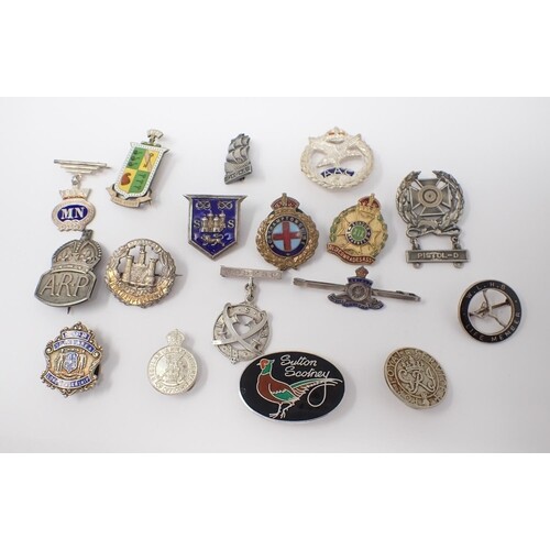 A collection of silver and white metal Military and other La...