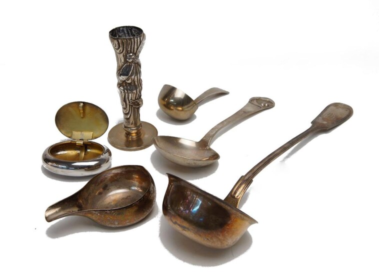 A group of silver comprising: a Danish silver spoon, by Matthiasen, Copenhagen, assay master Johannes Siggaard, designed with Art-Nouveau style terminal; a German silver sauce ladle; a repousse silver solifleur, designed to resemble a tree trunk...