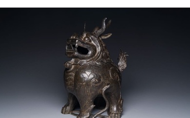 A large Chinese bronze censer and cover in the shape of a, M...