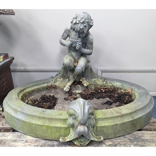 A late 19th/early 20th century oval lead garden fountain for...