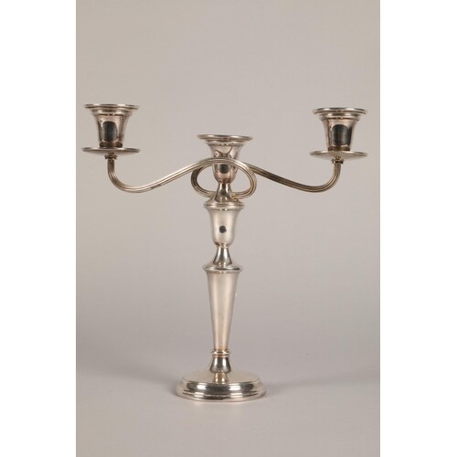 A late 20th century hallmarked silver twin branch candelabra...
