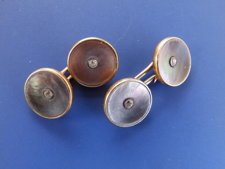 A pair of 18ct gold circular cufflinks, each set...