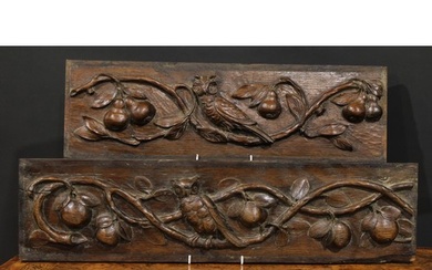 A pair of 19th century oak rectangular panels, each boldly c...