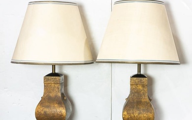 A pair of Chinese Han style burnished gilt metal table lamps with silk shades