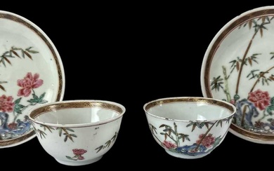 A pair of Chinese Yongzheng floral decorated porcelain tea bowls,...