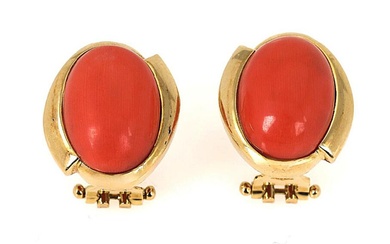 A pair of coral ear studs each set with a cabochon coral,...