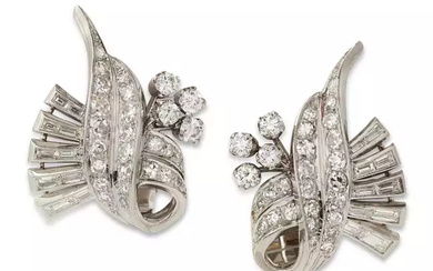 A pair of mid 20th century platinum diamond ear clips,...