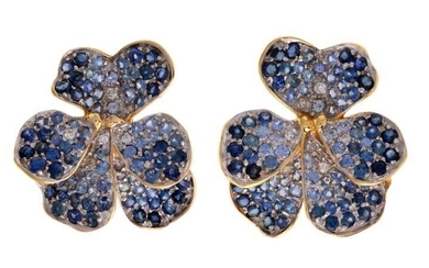 A pair of sapphire ear clips, by Vevey, each designed as a Violet, pave-set with circular-cut sapphires, accented with brilliant-cut diamonds, indistinctly signed, clip fittings, 3.00 x 2.5cm, with retailer's pouch
