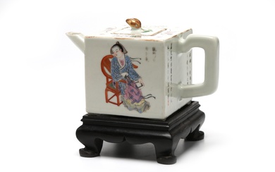 A polychrome porcelain rectangular teapot painted with Chinese epic, with wooden stand