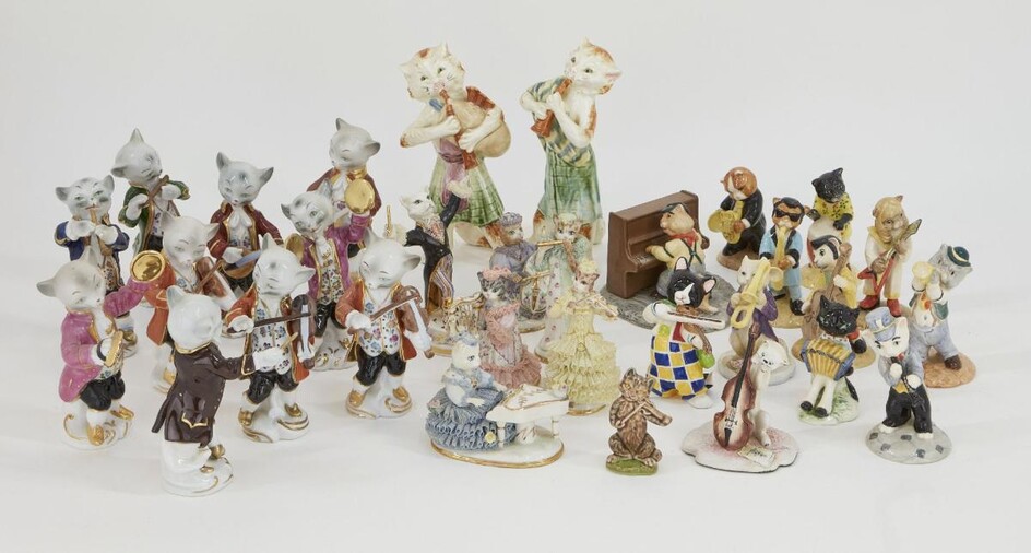 A quantity of cats with a musical theme, to include examples of Irish Dresden orchestra cats with factory marks, Goebel with factory marks, Beswick with factory marks, Gräfenthal with factory marks and further unmarked examples, tallest 20cm high...