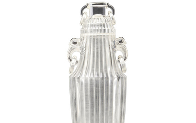 A rock crystal vase and cover with ribbed wall