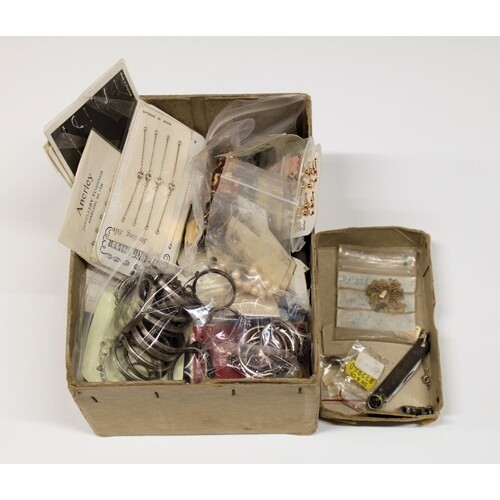 A rummage box of sterling silver and base metal ex-shop stoc...