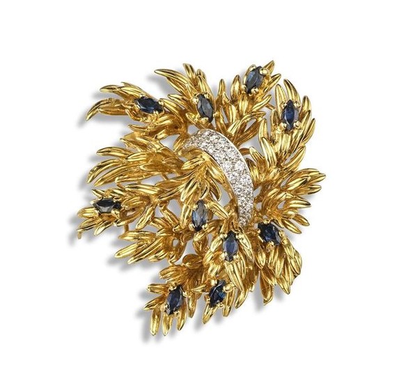A sapphire and diamond foliate brooch by Kutchinsky,...