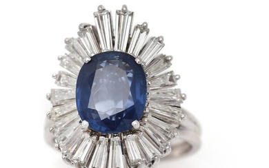NOT SOLD. A sapphire and diamond ring set with a sapphire weighing app. 2.14 ct. encircled by numerous diamonds, mounted in 18k white gold. Size 50.2. – Bruun Rasmussen Auctioneers of Fine Art