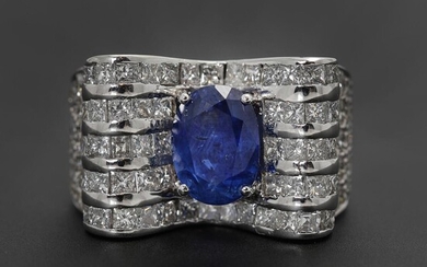 NOT SOLD. A sapphire and diamond ring set with a sapphire weighing app. 5.00 ct. encirceld by diamonds, mounted in 18k white gold. Size app. 57. – Bruun Rasmussen Auctioneers of Fine Art