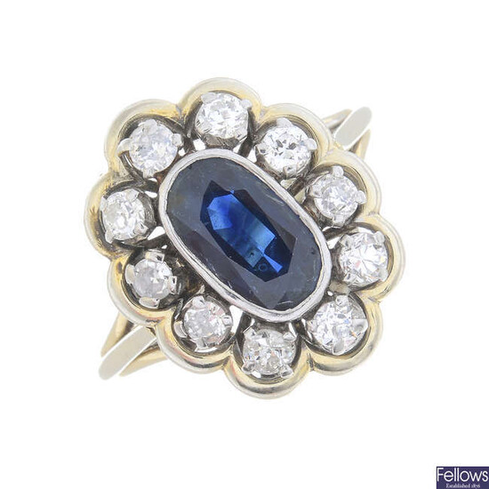 A sapphire and old-cut diamond cluster ring.