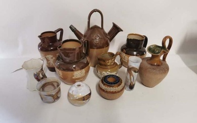A selection of Royal Doulton and Lambeth stoneware jugs to...