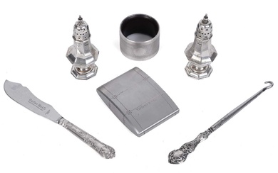 A selection of silver and white metal items