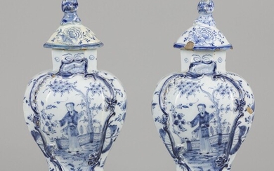 A set of (2) earthenware lidded vases with chinoiserie decoration, marked Het Fortuyn, Delft, 1730-1750....