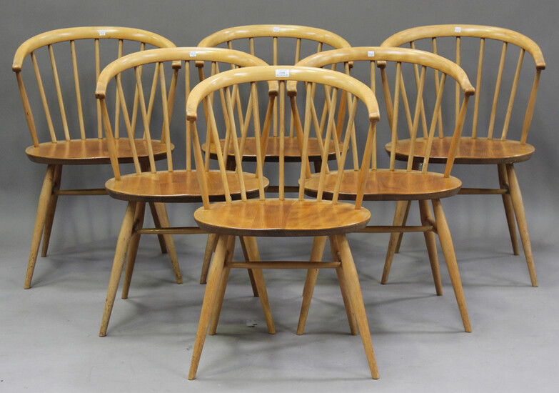 A set of six mid-20th century Ercol 'cowhorn' elbow chairs designed by Lucien Ercolani, mo