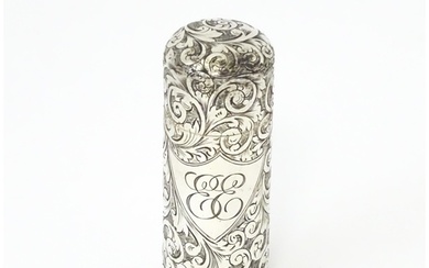 A silver scent / perfume bottle with engraved decoration ope...