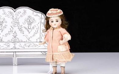 A small Kestner all-bisque Mignonette type doll