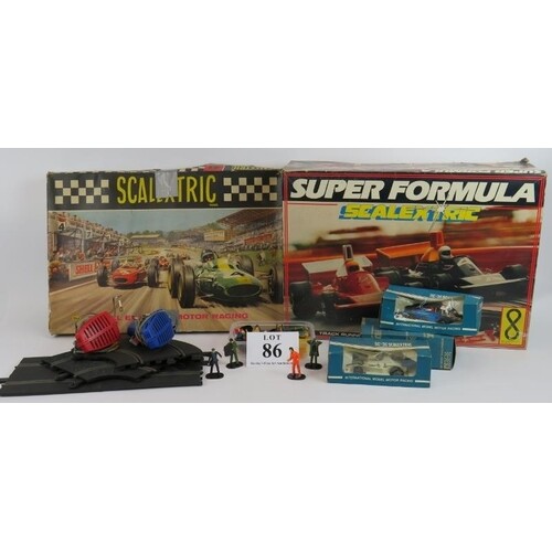 A vintage Scalextric set 31 in original box, a later C911 ra...