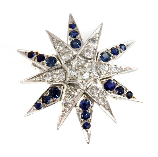 A white gold diamond and sapphire India Star brooch