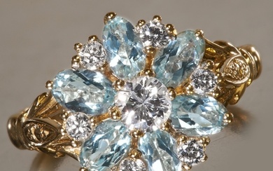 AQUAMARINE AND DIAMOND CLUSTER RING, High carat gold. Bright...