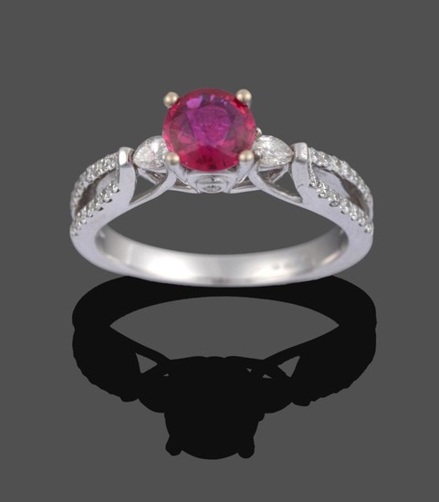 An 18 Carat White Gold Ruby and Diamond Ring, the...