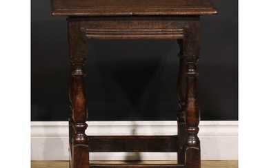 An 18th century oak joint stool, rectangular top with moulde...