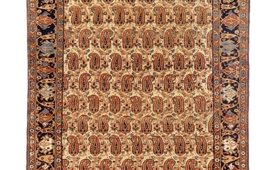 An antique Kashan Mohtasham rug, Persia. All over boteh design on an ivory field. Early 20th century. 194×130 cm.