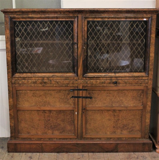 An antique design burr walnut veneered glass fronted cabinet...