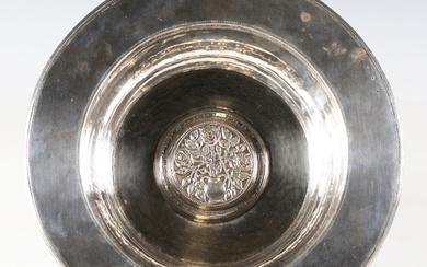 An early 20th century Arts and Crafts plated copper deep welled dish, in the manner of Omar Ramsden