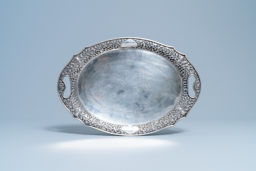 An oval silver tray with incised floral design, Thailand, 19/20th C.