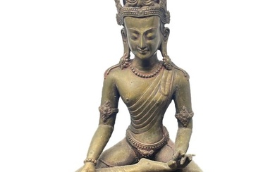 Antique Thai Gilt bronze seated Buddha figurine.